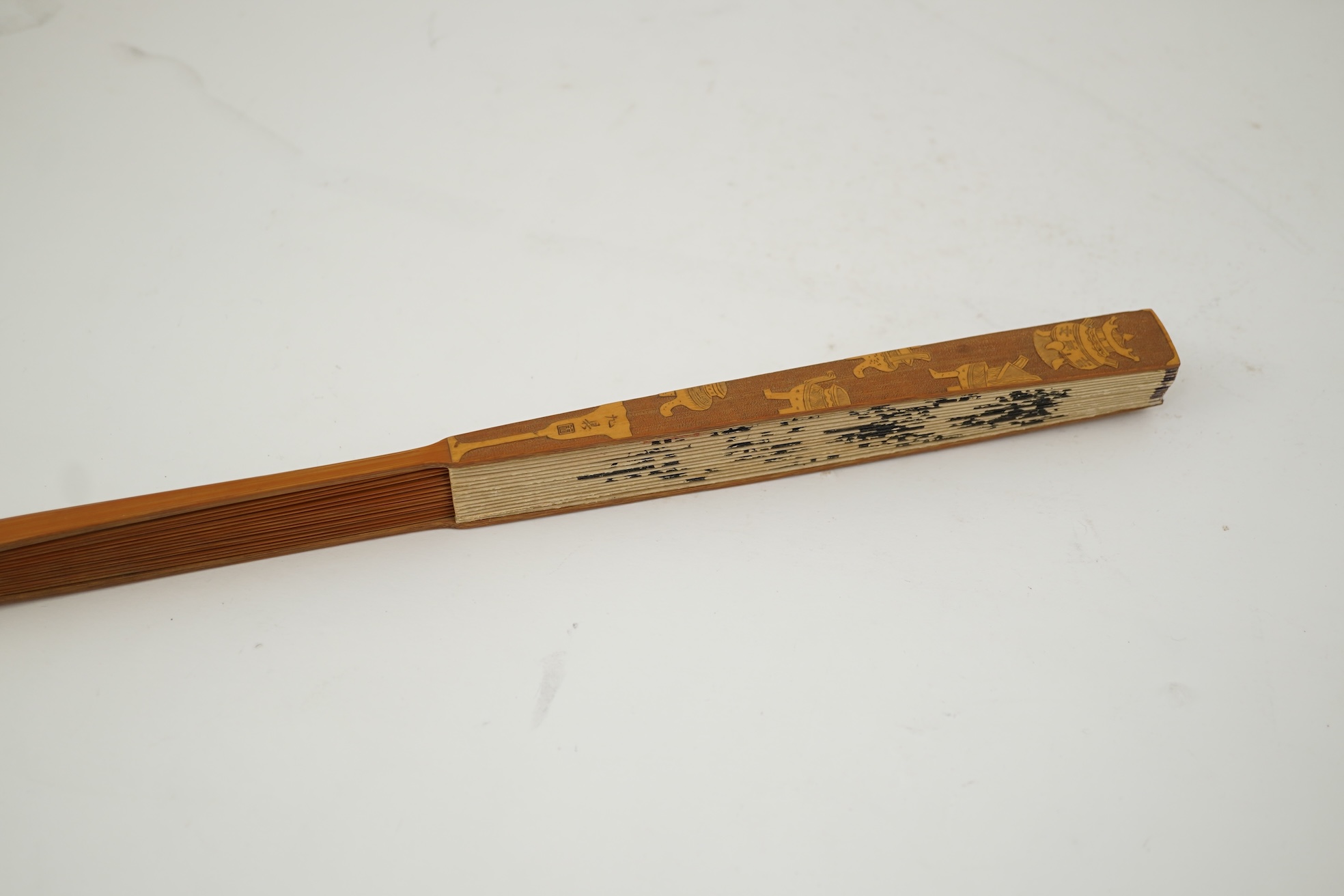 Two Chinese inscribed paper leaf fans, late 19th century